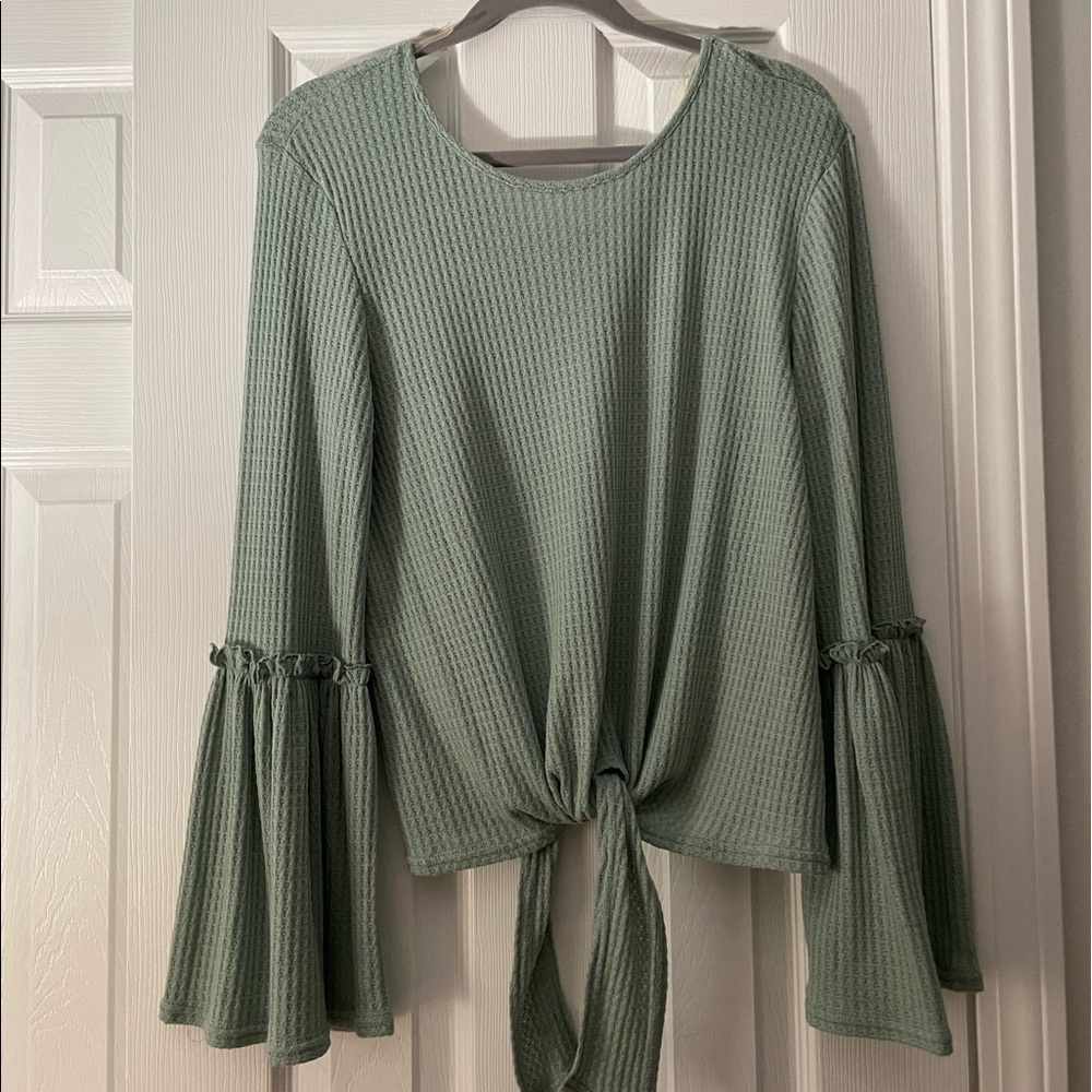 Bell- sleeved blouse